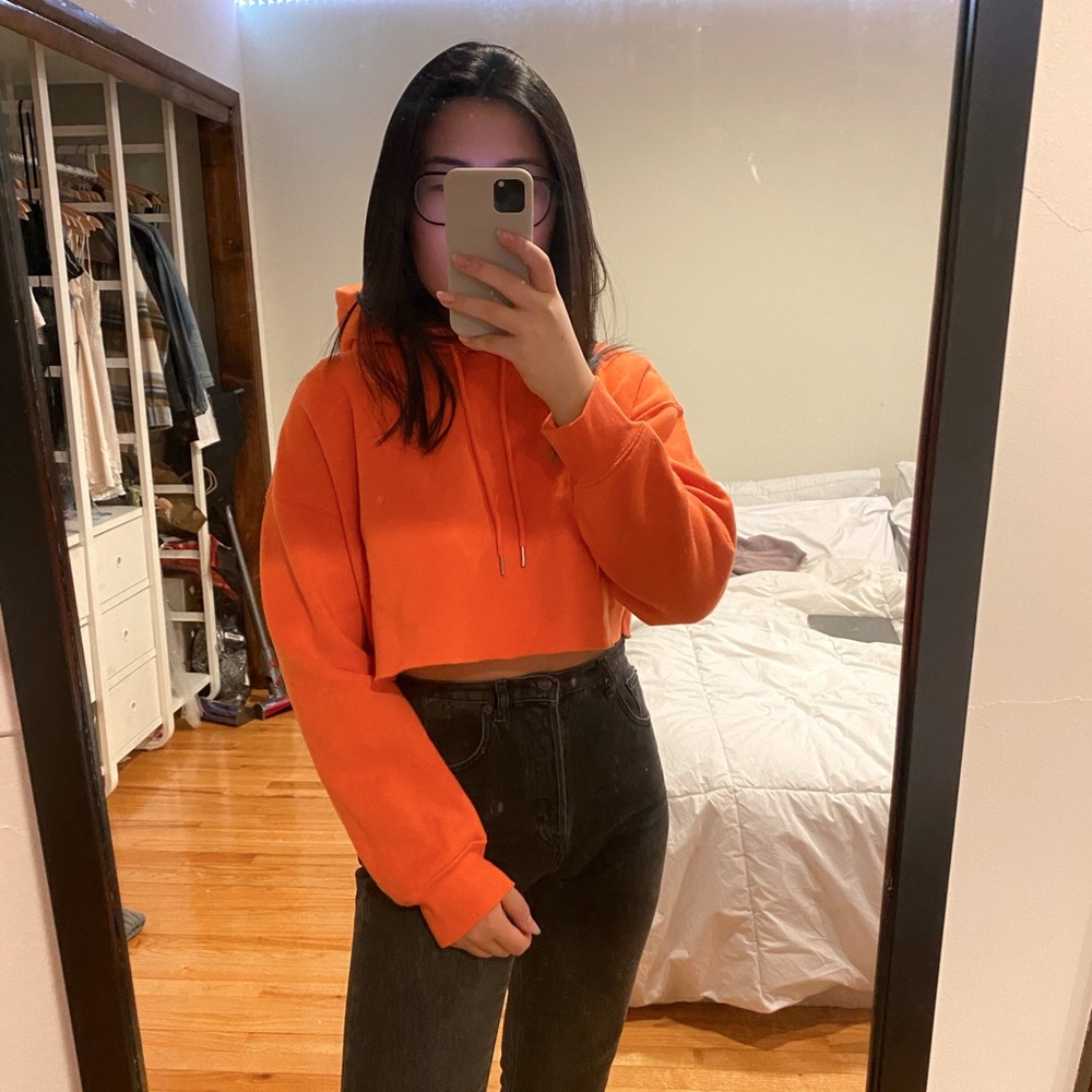cropped neon orange sweatshirt